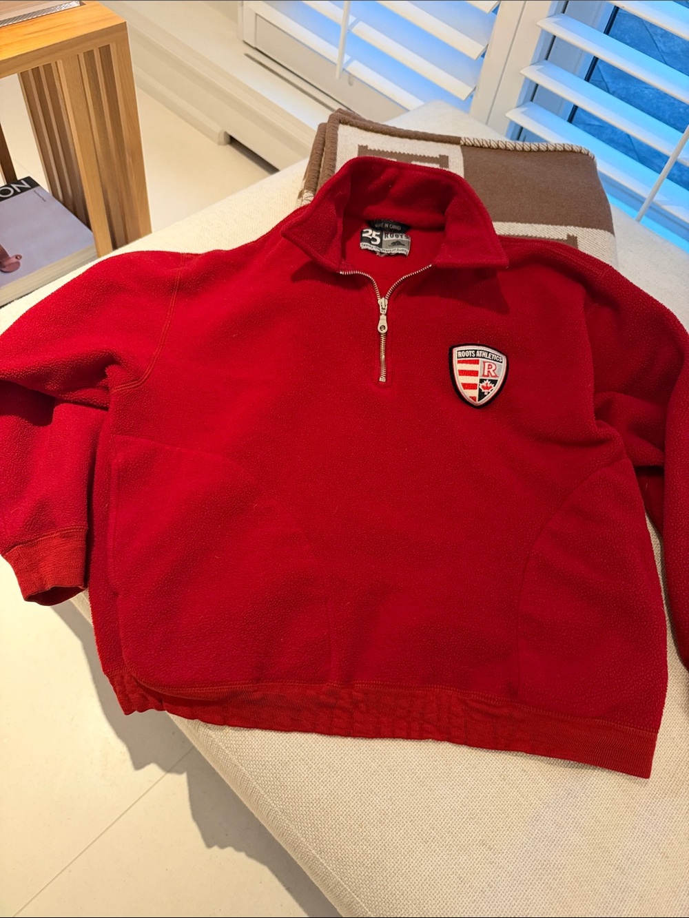 Roots woman’s Red Half-Zip Fleece with Shield Crest
